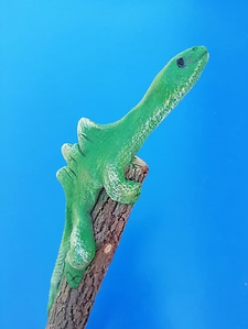 un crayon dinosaure de profil