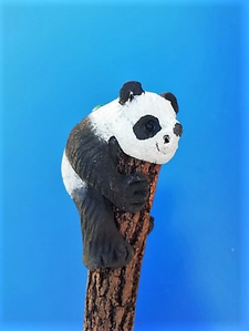 un crayon panda de profil